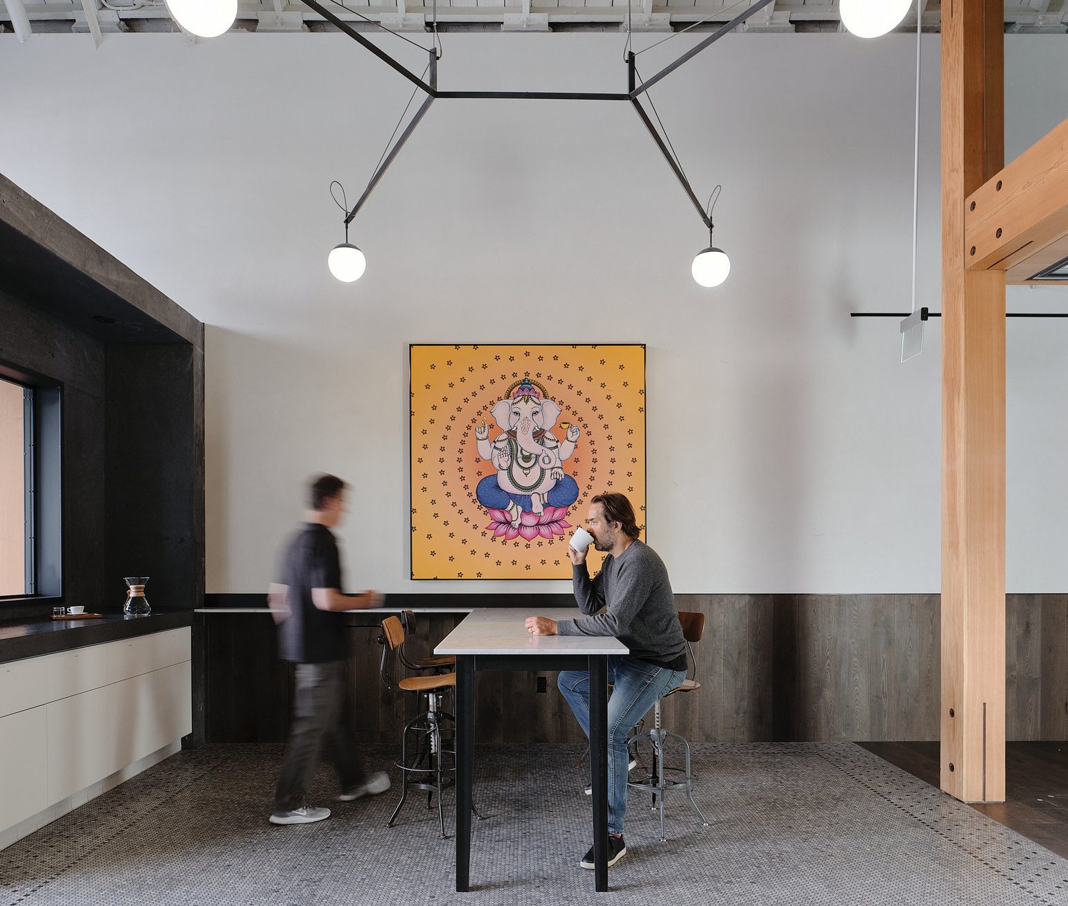 Two men inside a café