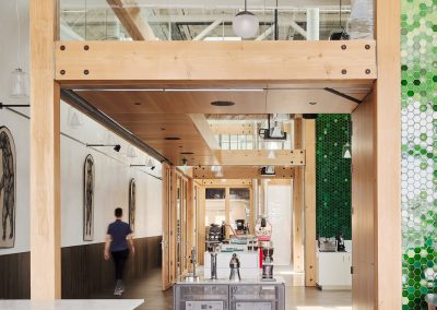 A view through The Crown from the Tasting Room through the Brew and Roast Labs.