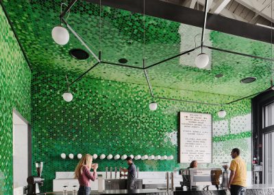 Guests enjoy coffee in the Tasting Room
